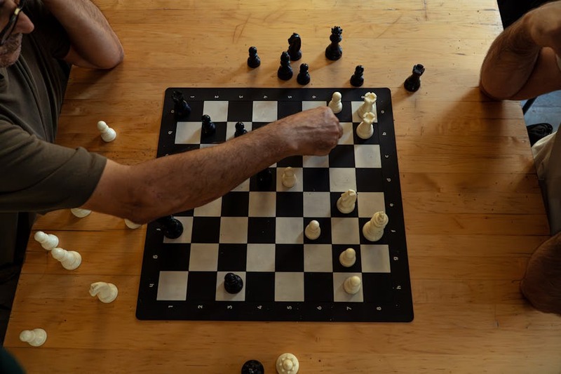 Chess players strategizing during a game in Istanbul, Türkiye.